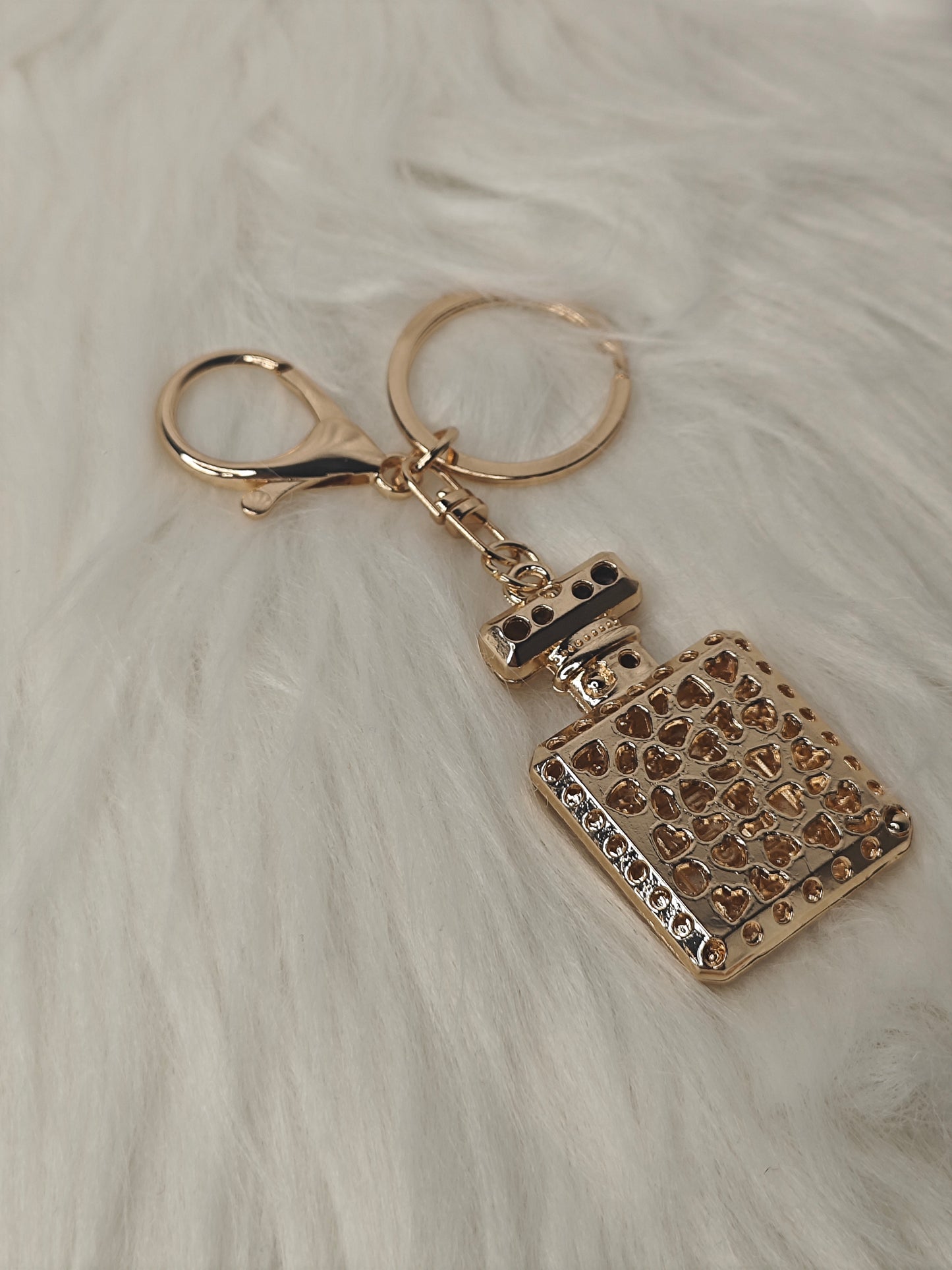 Parfum Charm – Eleganter Schlüsselanhänger in Champagne Gold mit Strassdetails
