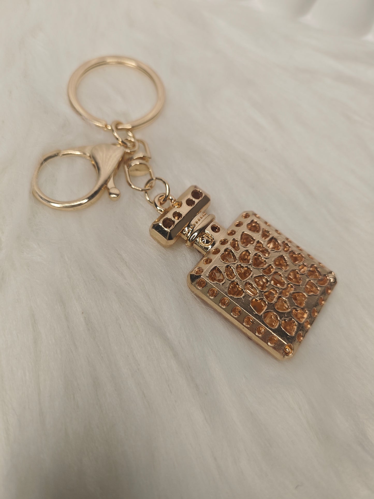 Parfum Charm – Eleganter Schlüsselanhänger in Roségold mit Strassdetails