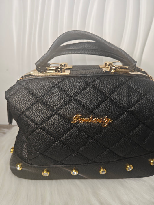 Notte Imperiale – Elegante gesteppte Umhängetasche in Schwarz mit Goldakzenten